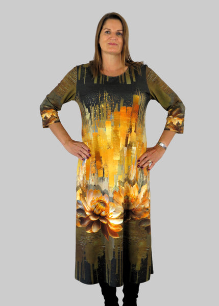 This panel dress is made from a soft feel jersey fabric, with an all over gold print. Perfect for any autumn / winter occasion from a wedding, mother of the bride, mother of the groom to a party or everyday wear. This dress will take you from day to night with effortless style and elegance.