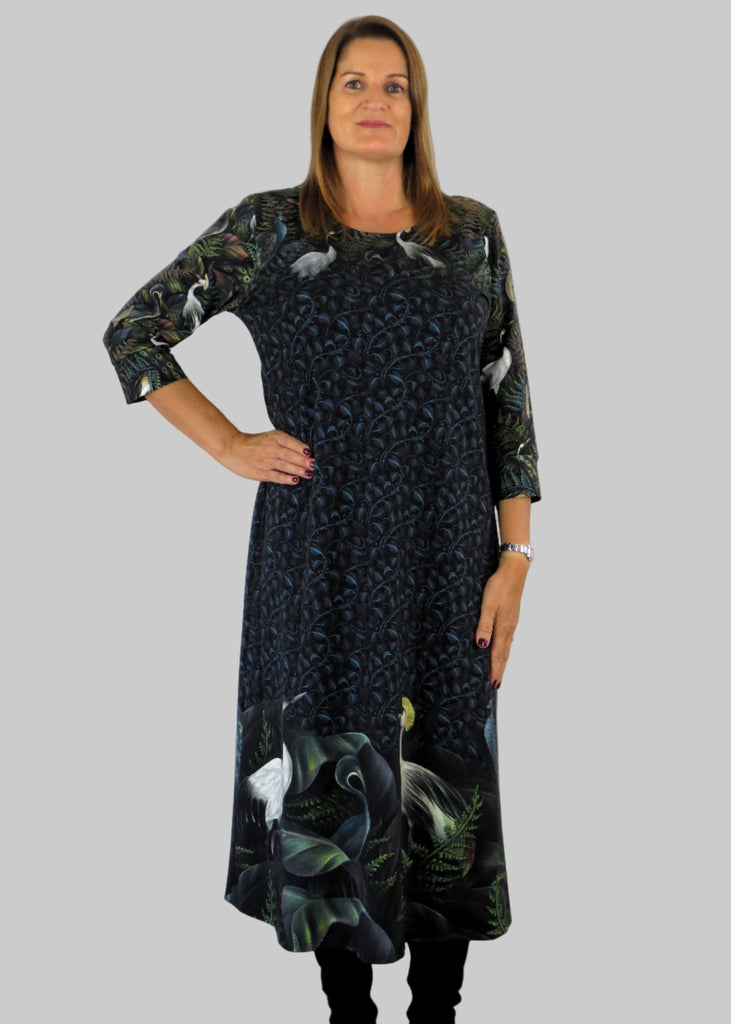 This panel dress is made from a soft feel jersey fabric, with an all over blue print. Perfect for any autumn / winter occasion from a wedding, mother of the bride, mother of the groom to a party or everyday wear. This dress will take you from day to night with effortless style and elegance.