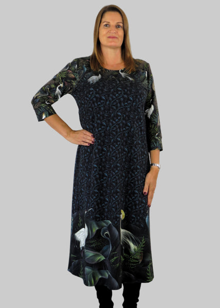 This panel dress is made from a soft feel jersey fabric, with an all over blue print. Perfect for any autumn / winter occasion from a wedding, mother of the bride, mother of the groom to a party or everyday wear. This dress will take you from day to night with effortless style and elegance.