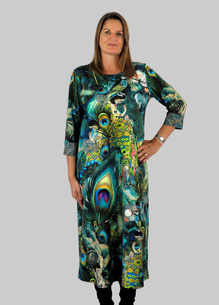 This panel dress is made from a soft feel jersey fabric, with an all over multicolour print. Perfect for any autumn / winter occasion from a wedding, mother of the bride, mother of the groom to a party or everyday wear. This dress will take you from day to night with effortless style and elegance.