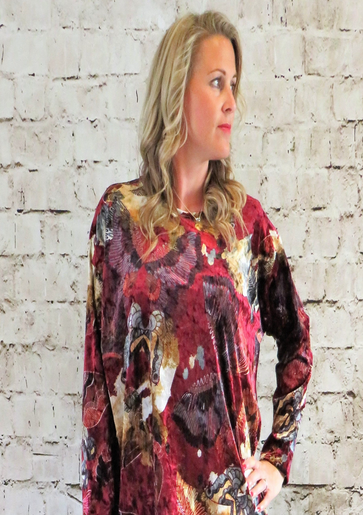 The wide top is made from a soft stretch red viscose velvet fabric, with a beautiful all over butterfly design. Perfect for any autumn winter occasion from a party to everyday wear. This top will take you from day to night with effortless style and elegance.