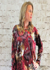 The wide top is made from a soft stretch red viscose velvet fabric, with a beautiful all over butterfly design. Perfect for any autumn winter occasion from a party to everyday wear. This top will take you from day to night with effortless style and elegance.