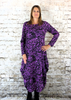 This hitch up dress is made from a soft feel cerise Jersey fabric, with an all over rose print. The dress has a hitch up hem on both sides, which can be buttoned up or let down for a longer length. Perfect for any autumn / winter occasion from a wedding, mother of the bride, mother of the groom to a party or everyday wear. This dress will take you from day to night with effortless style and elegance. Available in Aqua, Cerise and White.