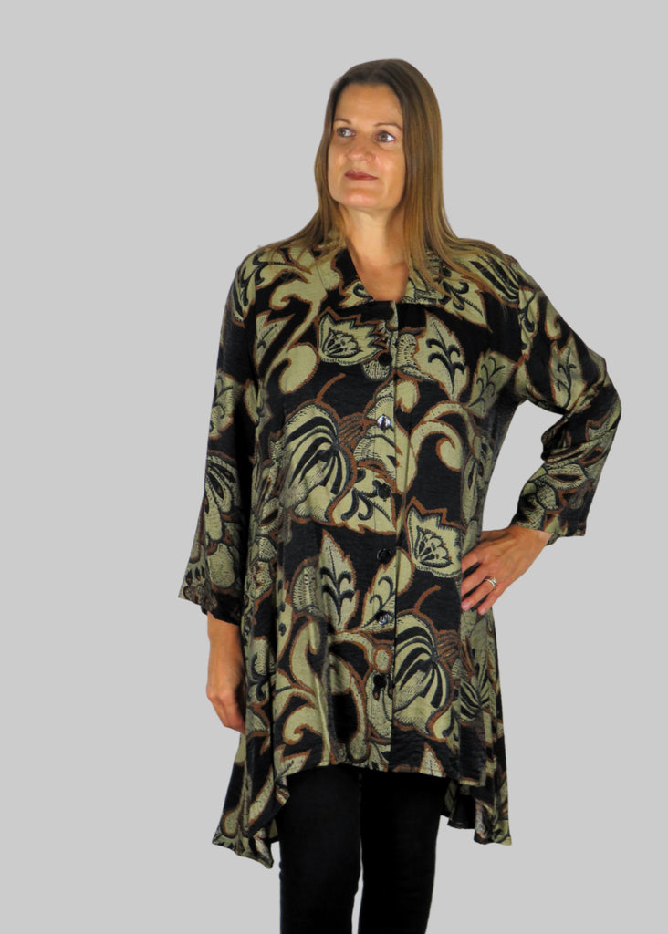This tunic blouse is made from a beautiful soft fabric with an all over black, brown and grey print. Perfect for any autumn winter occasion, from a party to everyday wear. This blouse will take you from day to night with effortless style and elegance.