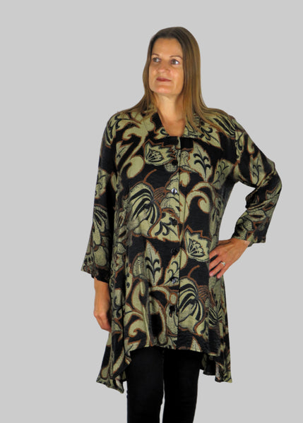 This tunic blouse is made from a beautiful soft fabric with an all over black, brown and grey print. Perfect for any autumn winter occasion, from a party to everyday wear. This blouse will take you from day to night with effortless style and elegance.