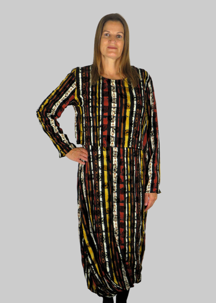 This dress has jersey top and beautiful black embossed fabric balloon twist skirt, completing the look with the over top all in a stripe print. Perfect for any autumn winter occasion, from a wedding, Mother of the Bride, Mother of the Groom, Wedding Guest to a party or everyday wear. This dress will take you from day to night with effortless style and elegance.