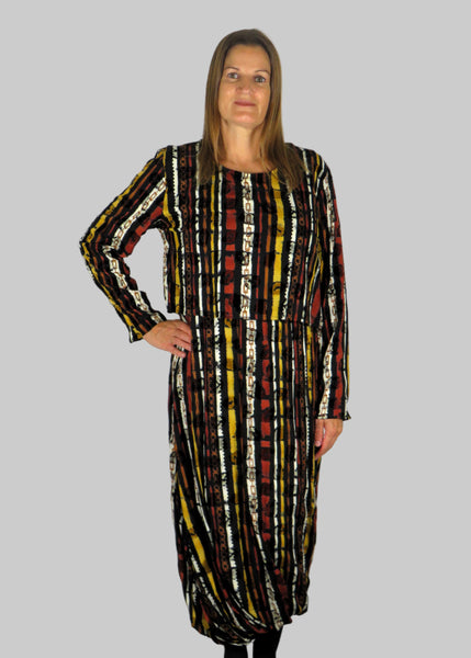 This dress has jersey top and beautiful black embossed fabric balloon twist skirt, completing the look with the over top all in a stripe print. Perfect for any autumn winter occasion, from a wedding, Mother of the Bride, Mother of the Groom, Wedding Guest to a party or everyday wear. This dress will take you from day to night with effortless style and elegance.