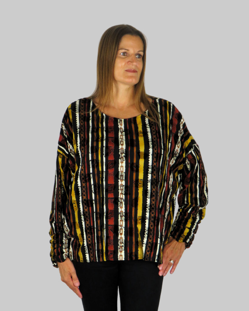 This wide top is made from a embossed black stripe fabric. Perfect for any autumn winter occasion, from a party to everyday wear. This top will take you from day to night with effortless style and elegance.