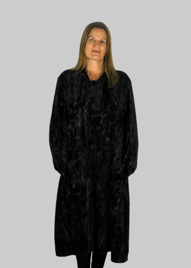 This coat is made from a soft stretch black viscose velvet fabric, with an embossed flower all over design. Perfect for any autumn winter occasion, from a wedding, Mother of the Bride, Mother of the Groom, Wedding Guest to a party or everyday wear. This coat will take you from day to night with effortless style and elegance. Please note: The coat is unlined.
