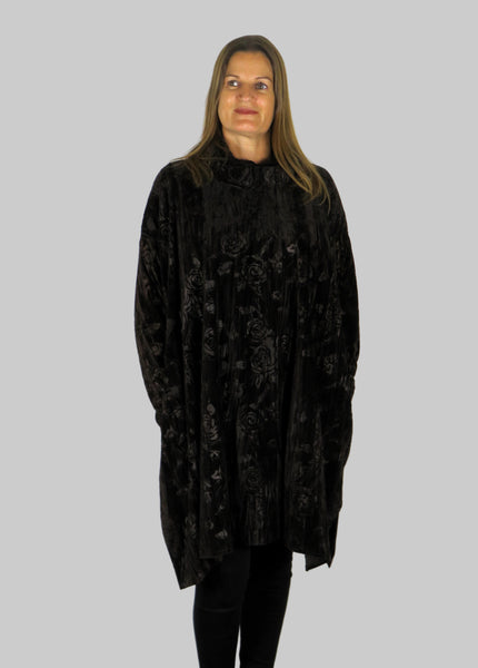 This tunic blouse is made from a soft stretch brown viscose velvet fabric, with an embossed flower all over design. Perfect for any autumn winter occasion, from a party to everyday wear. This blouse will take you from day to night with effortless style and elegance.