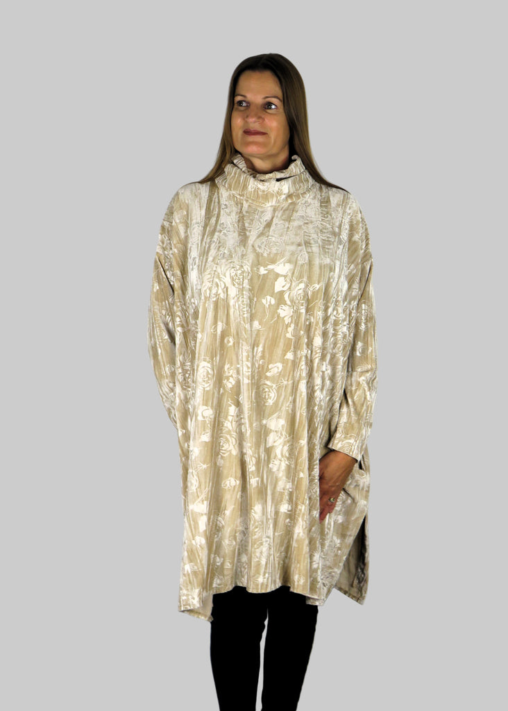 This tunic is made from a soft stretch cream viscose velvet fabric, with an embossed flower all over design, with a cowl neck. Perfect for any autumn winter occasion, from a party to everyday wear. This top will take you from day to night with effortless style and elegance
