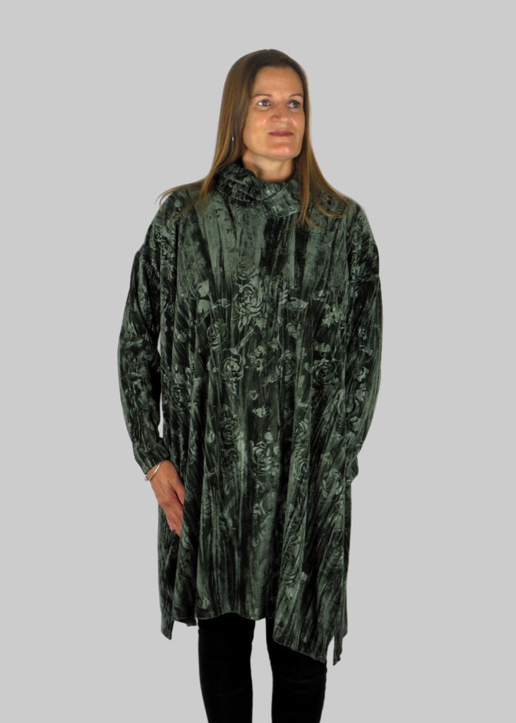 This tunic is made from a soft stretch green viscose velvet fabric, with an embossed flower all over design, with a cowl neck. Perfect for any autumn winter occasion, from a party to everyday wear. This top will take you from day to night with effortless style and elegance