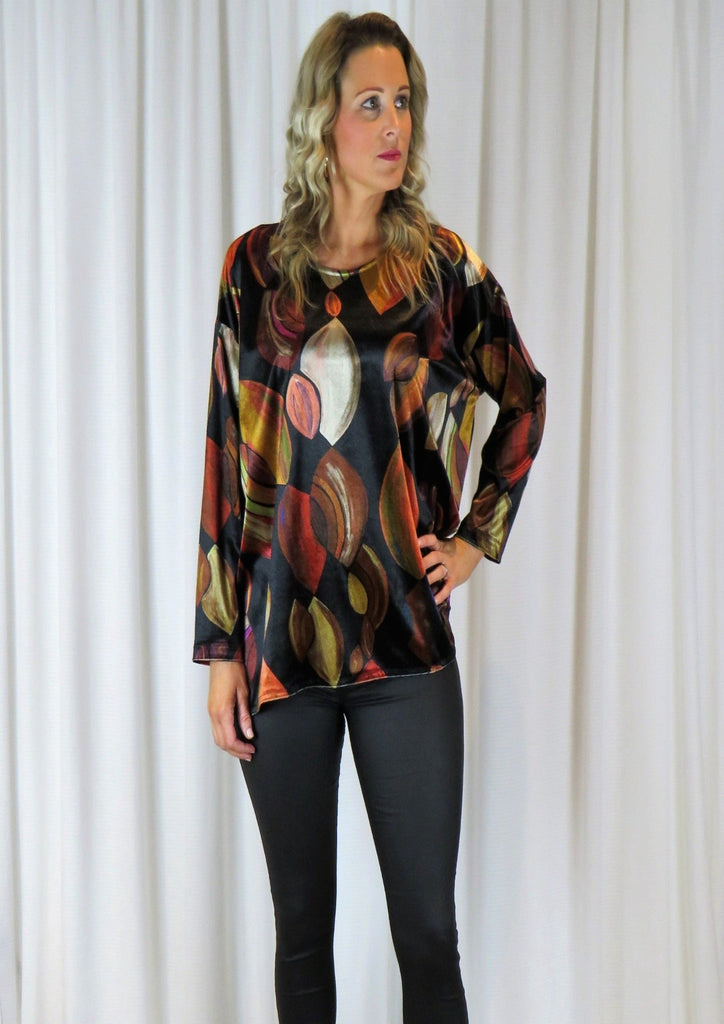 The wide top is made from a soft stretch viscose velvet fabric, with a beautiful all over autumnal design. Perfect for any autumn winter occasion from a party to everyday wear. This top will take you from day to night with effortless style and elegance.