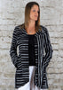 The riding jacket is made from a soft black linen, with an all over white print. The jacket has a beautiful frill back and front pockets. Perfect for any spring summer occasion, from a wedding to any celebration or everyday wear. This jacket will take you from day to night with effortless style and elegance.