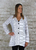 The riding jacket is made from a soft white linen, with an all over black print. The jacket has a beautiful frill back and front pockets. Perfect for any spring summer occasion, from a wedding to any celebration or everyday wear. This jacket will take you from day to night with effortless style and elegance.